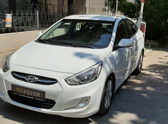 FOYER RENT A CAR HYUNDAI ACCENT BLUE
